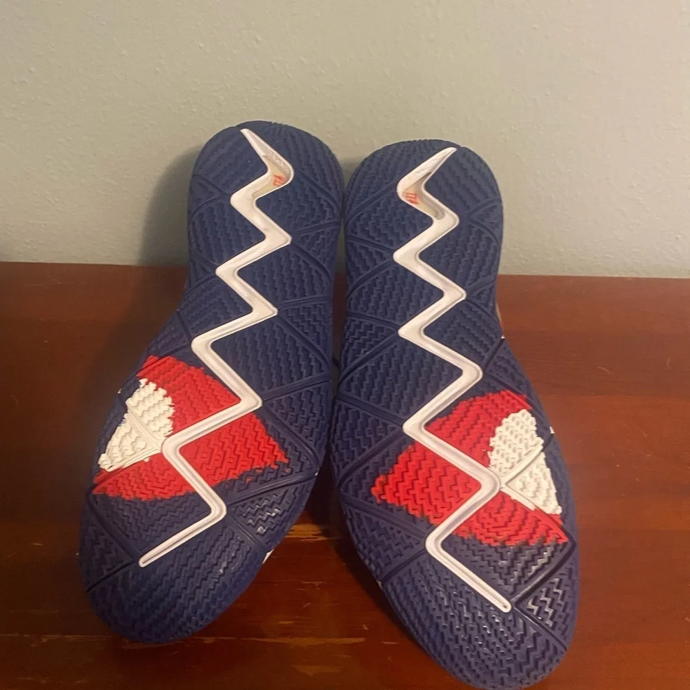 Nike Red, Blue, and Gold Athletic Shoes Nike Kyrie2